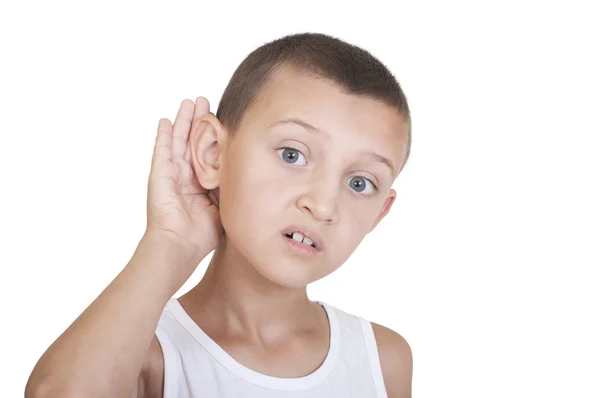 Boy put his hand to his ear — Stock Photo, Image