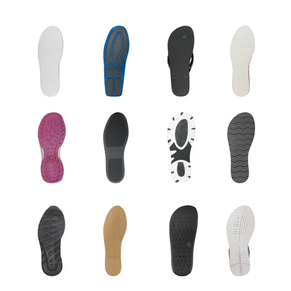 Zbiór różnych podeszwy butów na białym tle — Zdjęcie stockowe