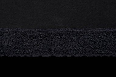 Siyah arkaplanda dantelli siyah kumaş parçası