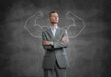Strong and powerful businessman clipart