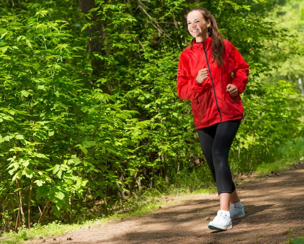 Healthy young female athlete running — Stock Photo, Image