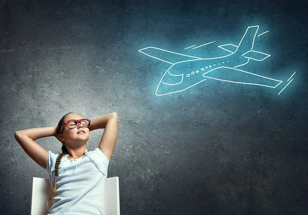 School girl dreams about journey — Stock Photo, Image