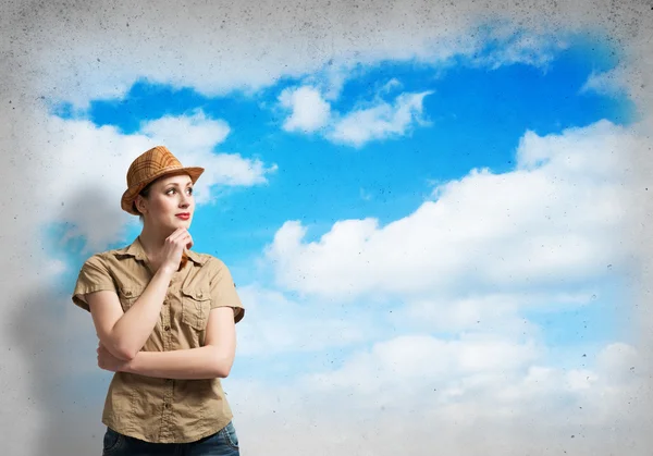 Girl in casual on sky background — Stock Photo, Image