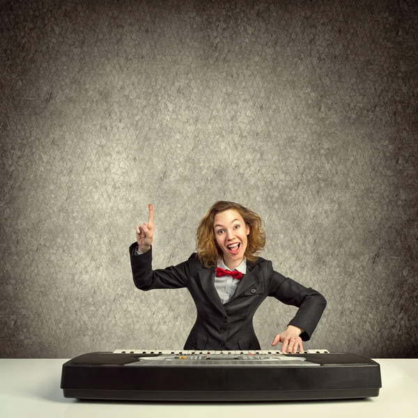 Mad woman play piano — Stock Photo, Image