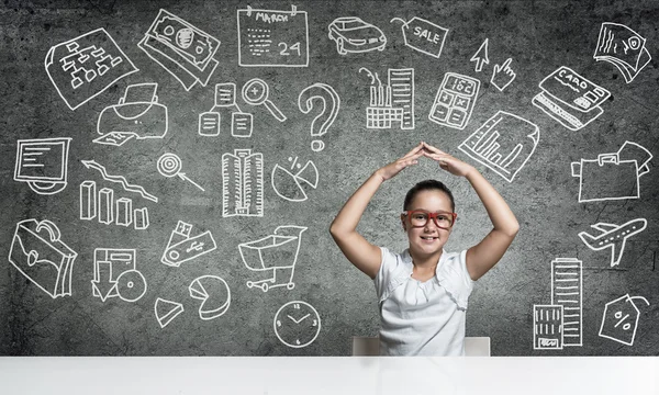 School girl with hands covering head — Stock Photo, Image