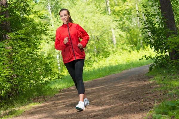 Female athlete running — Stock Photo, Image