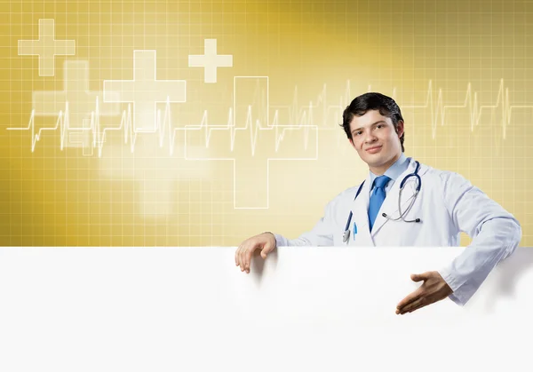 Doctor con banner en blanco — Foto de Stock