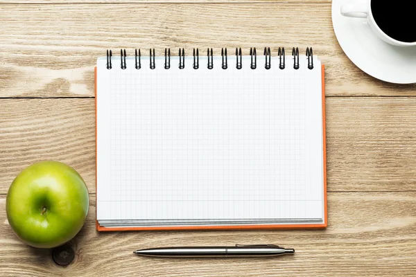 Blank notepad with cup of coffee — Stock Photo, Image