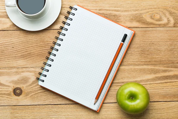 Blank notepad with cup of coffee — Stock Photo, Image