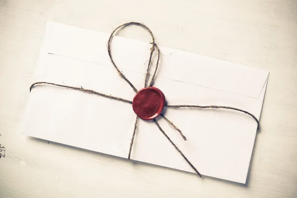White envelope with wax seal — Stock Photo, Image