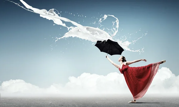 Woman dancer with black umbrella — Stock Photo, Image