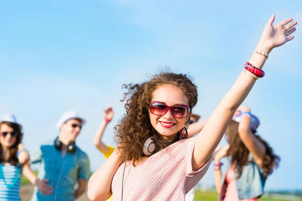 Young woman with headphones — Stock Photo, Image