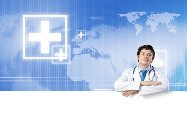 Doctor with blank banner — Stock Photo, Image