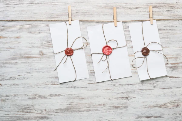 Envelopes hanging on ropes — Stock Photo, Image