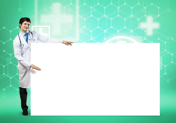 Mężczyzna lekarz z pusty transparent — Zdjęcie stockowe