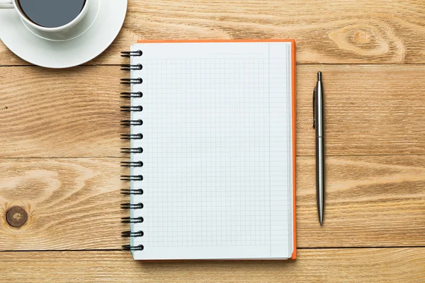 Blank with cup of coffee and pen — Stock Photo, Image