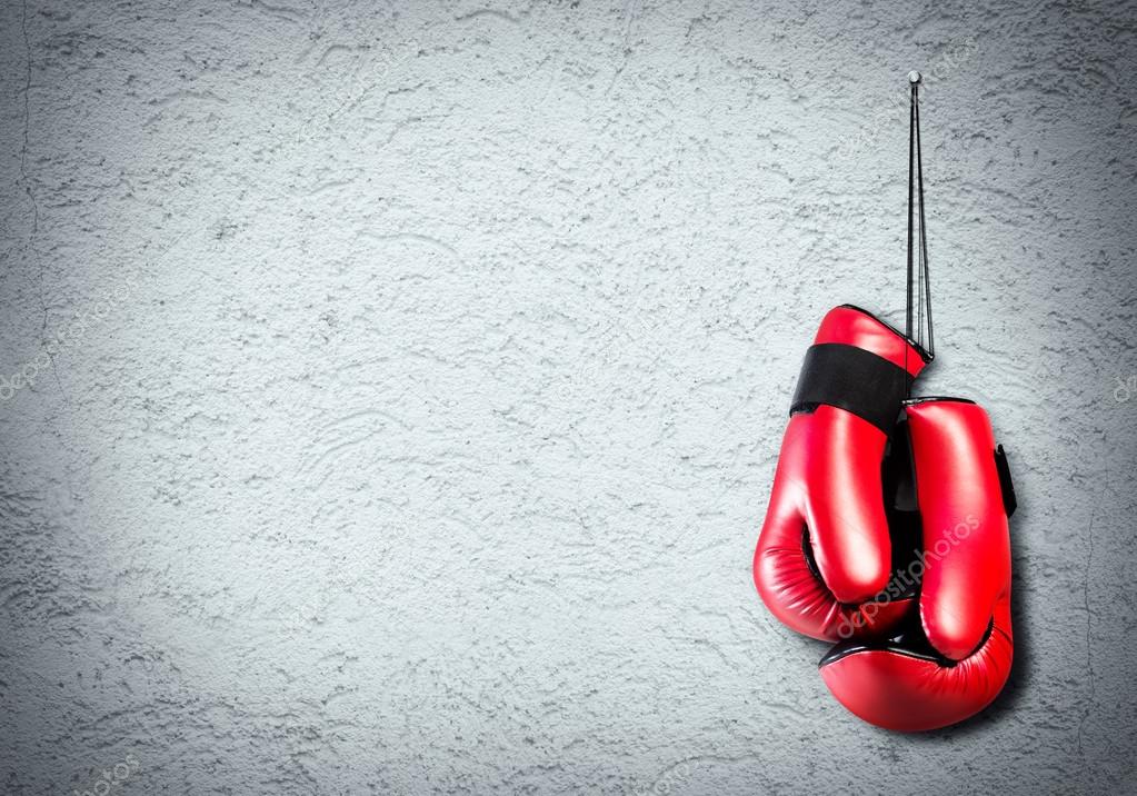 Boxing gloves on wall Stock Photo by ©Khakimullin 106052998