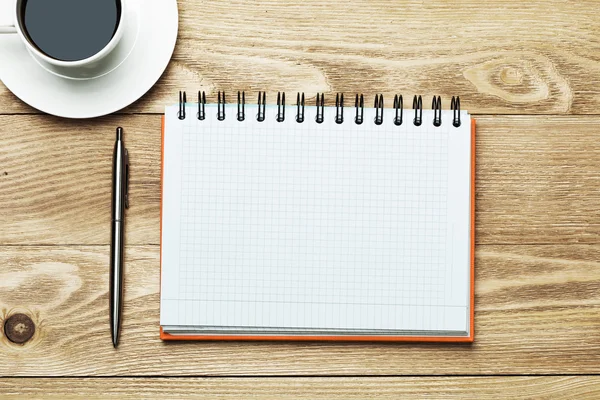 Blank with cup of coffee and pen — Stock Photo, Image