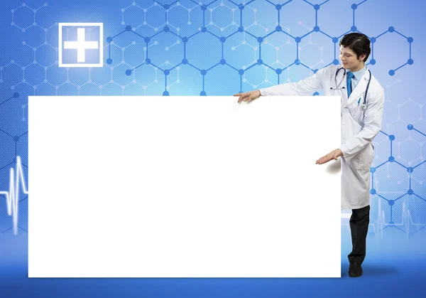 Male doctor with blank banner — Stock Photo, Image