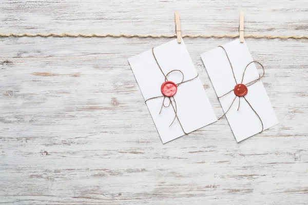 Envelopes hanging on ropes — Stock Photo, Image