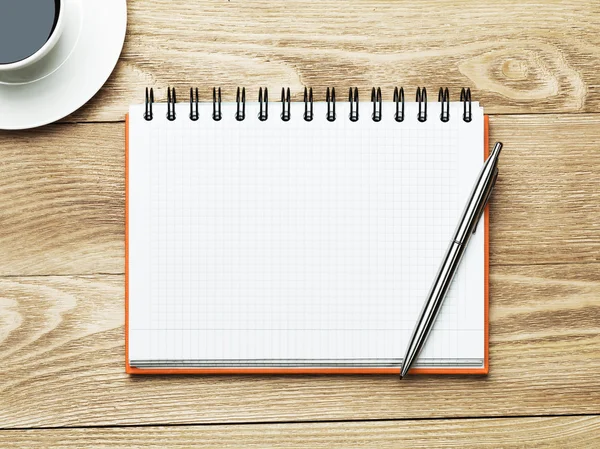 Blank with cup of coffee and pen — Stock Photo, Image