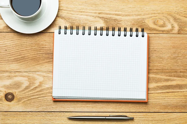 Blank with cup of coffee and pen — Stock Photo, Image