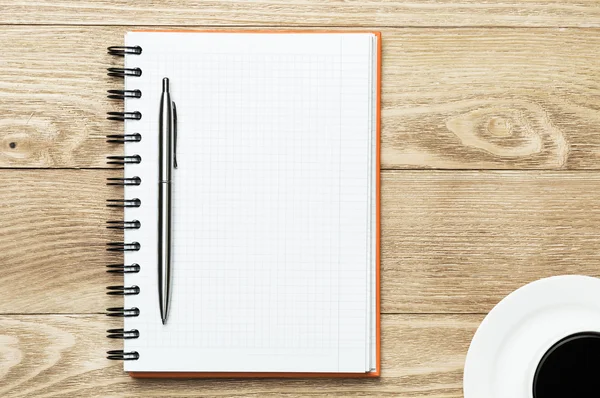 Blank with cup of coffee and pen — Stock Photo, Image