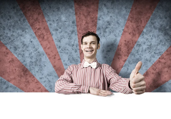 Cheerful man with banner — Stock Photo, Image