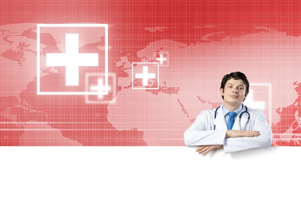 Doctor with white blank banner — Stock Photo, Image