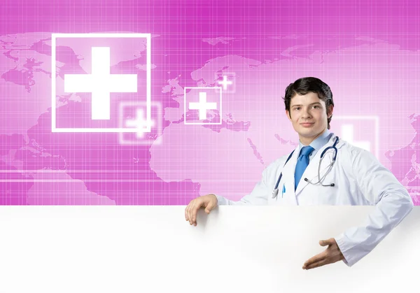 Doctor with white blank banner — Stock Photo, Image