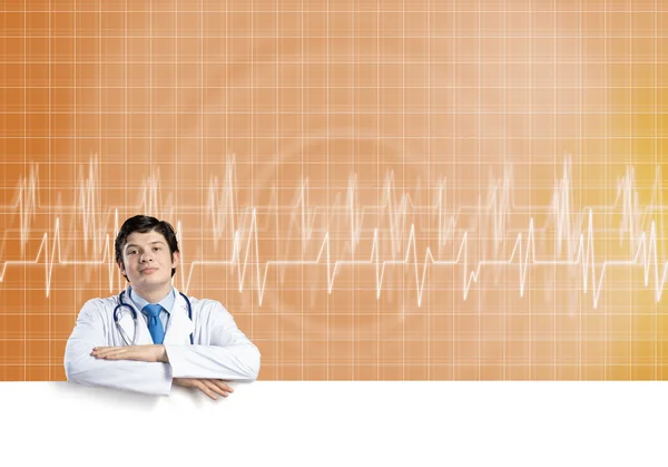 Doctor with white blank banner — Stock Photo, Image