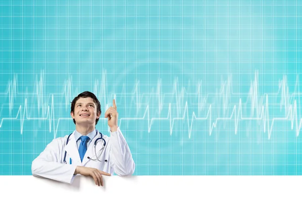 Doctor with white blank banner — Stock Photo, Image