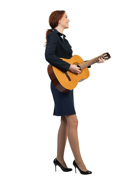 Businesswoman playing guitar — Stock Photo, Image