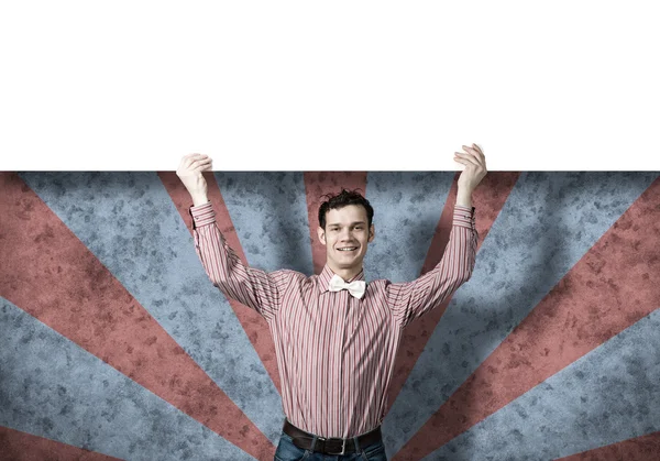 Cheerful man with banner — Stock Photo, Image