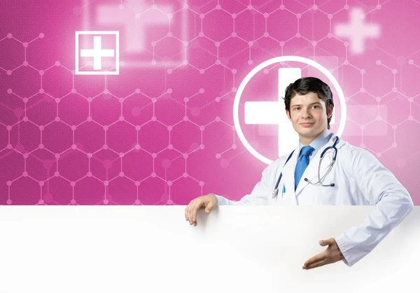 Doctor with white blank banner — Stock Photo, Image