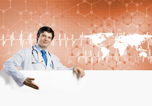 Doctor with white blank banner — Stock Photo, Image