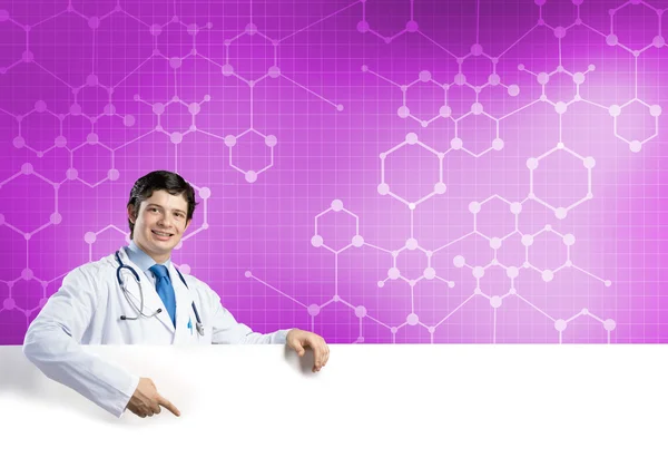 Doctor with white blank banner — Stock Photo, Image