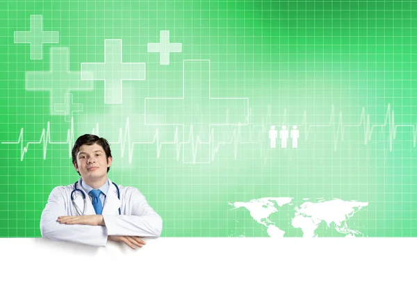 Doctor with white blank banner — Stock Photo, Image