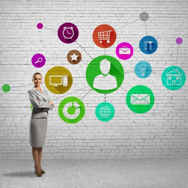 Businesswoman and application icons — Stock Photo, Image