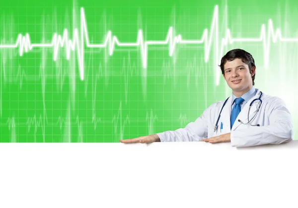 Doctor with white blank banner — Stock Photo, Image