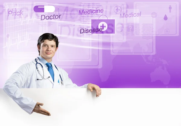 Doctor with white blank banner — Stock Photo, Image