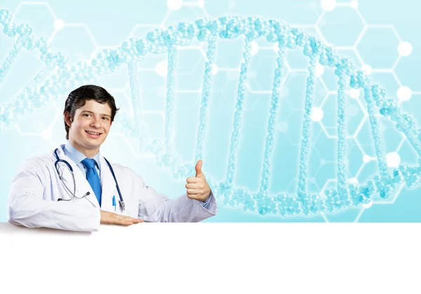 Doctor with white blank banner — Stock Photo, Image