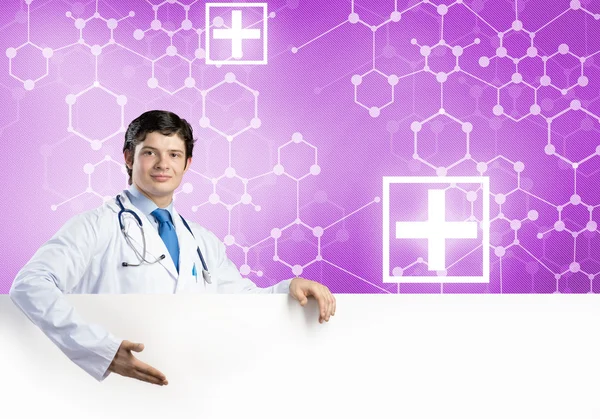 Doutor com banner branco em branco — Fotografia de Stock