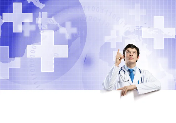 Arzt mit weißem leeren Banner — Stockfoto