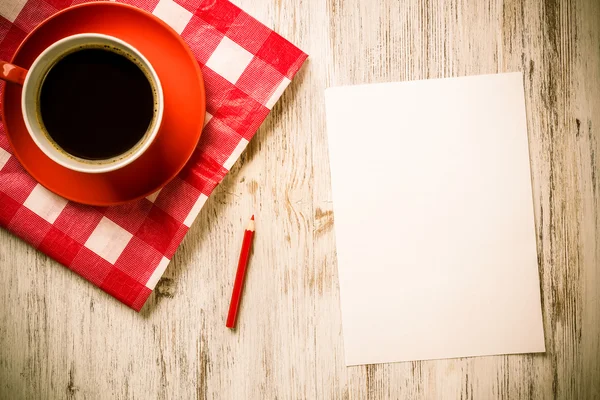 Hoja de papel y taza de café — Foto de Stock