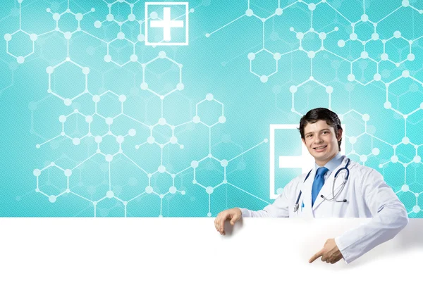 Doctor with white blank banner — Stock Photo, Image