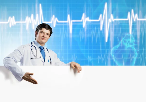 Doctor with white blank banner — Stock Photo, Image