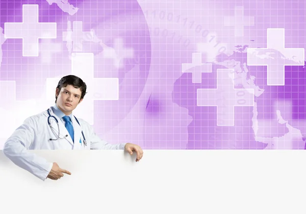 Doctor with white blank banner — Stock Photo, Image