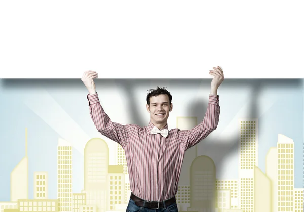 Ragazzo con banner edifici — Foto Stock