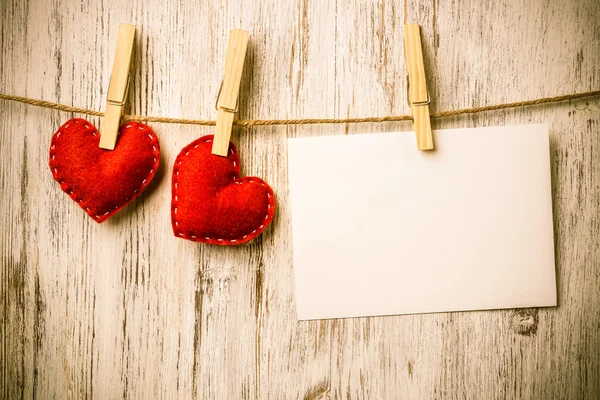 Blank sheet of paper with hearts — Stock Photo, Image